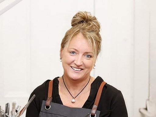 Portrait of Ann King, Founder of REALM Fine Fashion Jewelry